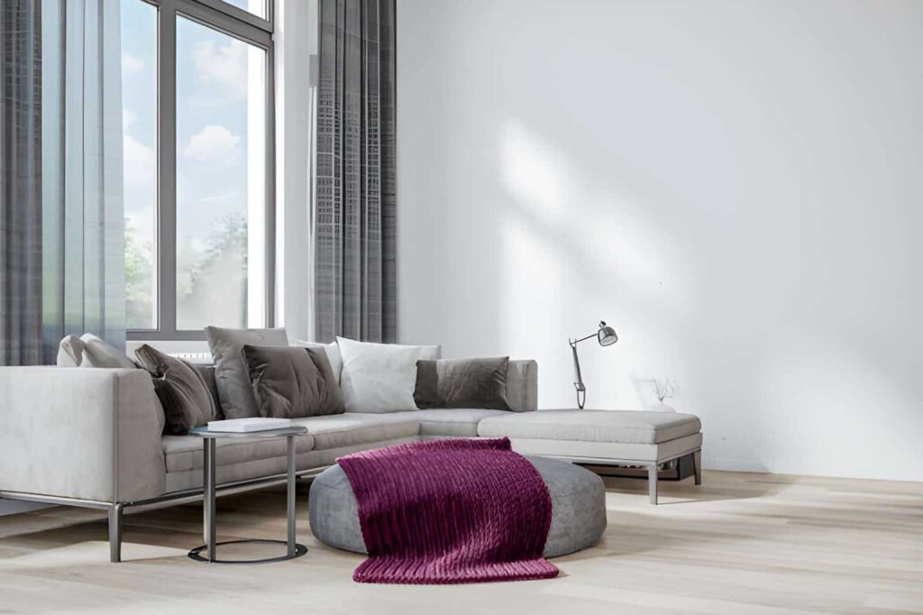 Modern living room with large aluminium windows in a Smeaton Grange home