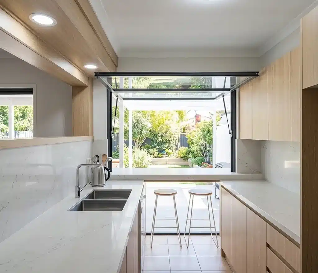 After gas strut servery window