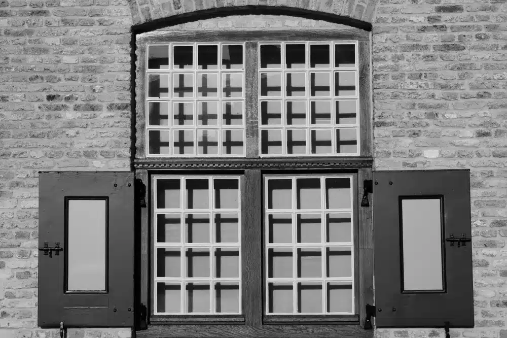 Popular Powder Coat Colours for Windows and Doors 1 Matte black powder coated aluminium window frame on a contemporary house facade