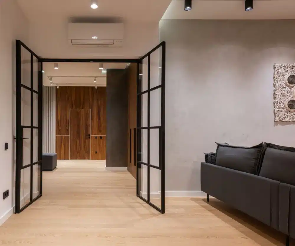 Full Glass Hinged Doors Mount Annan | Free Quote 4 Tradesperson installing a full glass aluminium hinged door at a residential property in South West Sydney
