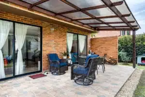 Wide aluminium sliding doors opening to alfresco area in Ingleburn NSW home