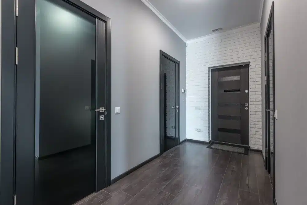Aluminium Sliding Doors in Ingleburn, NSW | Free Quote 4 Tradesperson installing aluminium sliding door in residential Macarthur region home