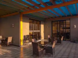 Double glazed aluminium sliding doors opening onto a patio in Liverpool NSW