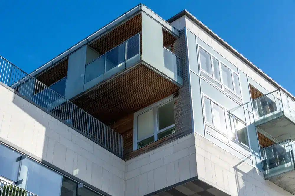 Double Glazed Windows in Camden, NSW | Free Quote 2 Tradesperson fitting Low-E double glazed glass unit into aluminium window frame