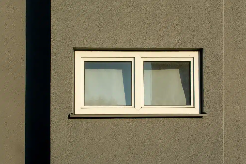 Are Double Glazed Windows Worth It in Sydney? 1 Are double glazed windows worth it: Close-up of a powder coated aluminium double glazed window frame and sealed glass unit