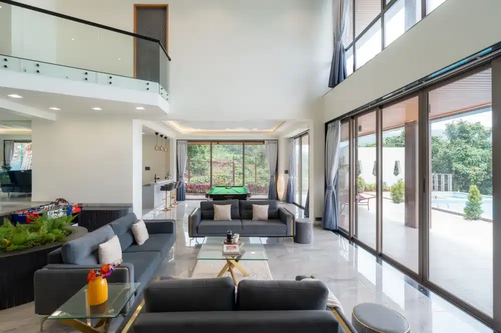 Double Hung vs Sliding Windows for Your Home 1 Aluminium sliding window open in a bright contemporary Australian living room