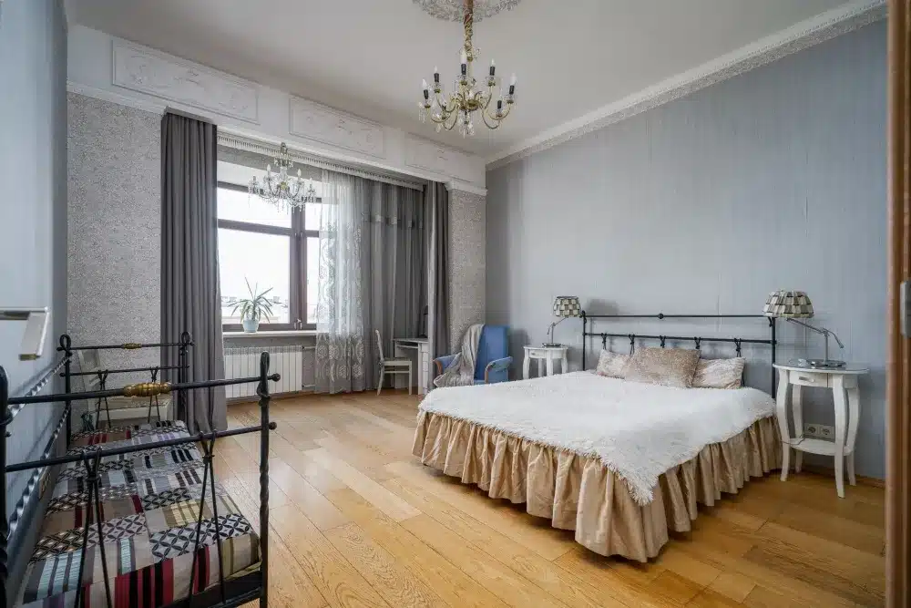 Double Hung vs Sliding Windows for Your Home 2 Double hung window open at top and bottom for cross ventilation in bedroom