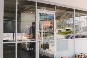Modern glass shopfront glazing on a retail store in Oran Park NSW