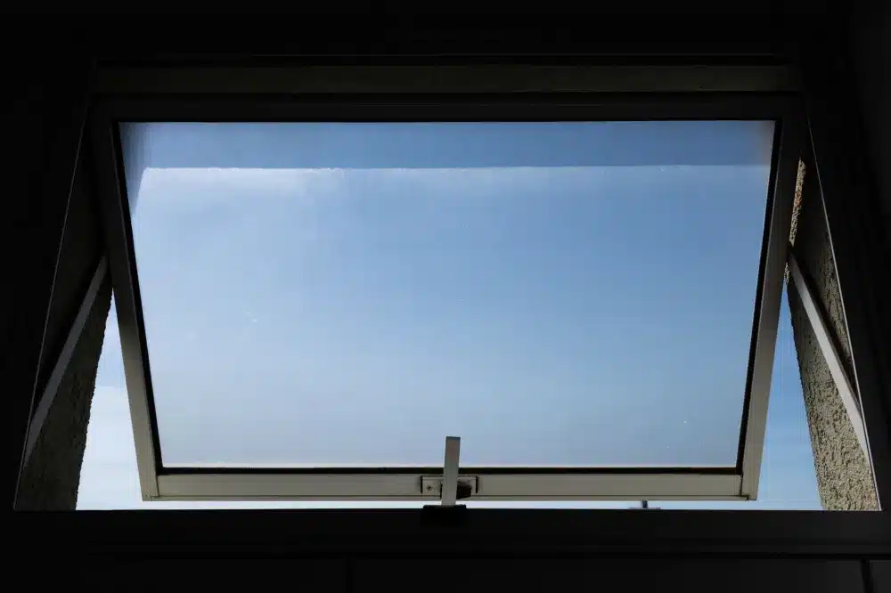 Fresh air flowing through open sashless double hung windows in an Australian home