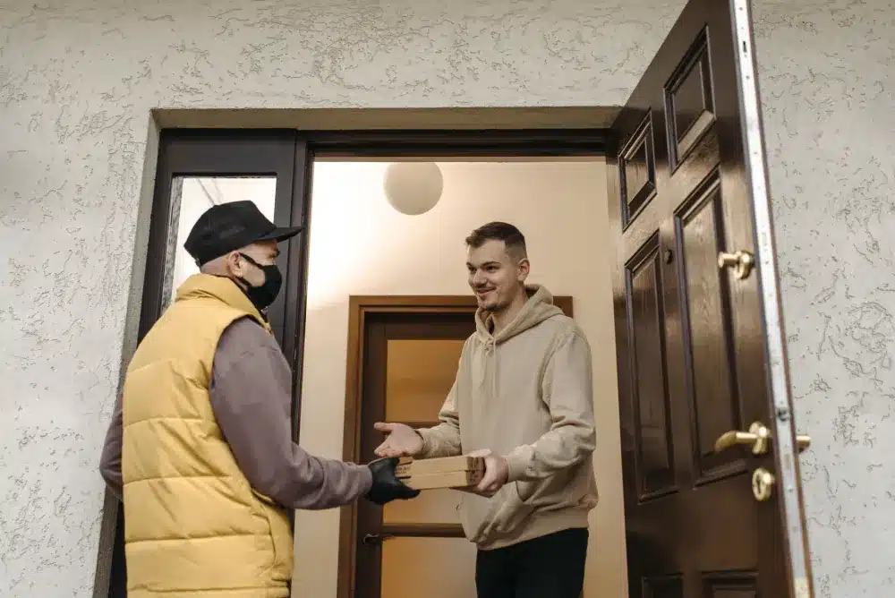 Security Screen Doors in Campbelltown, NSW | Free Quote 3 Tradesperson measuring front door opening for custom security screen door installation