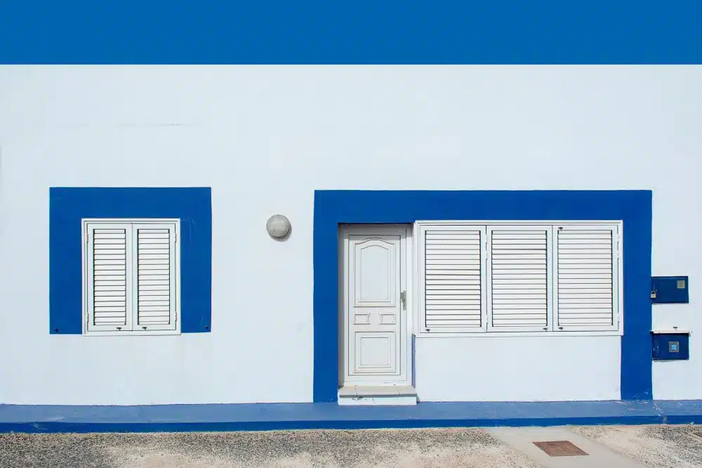 Shopfront Doors vs Apartment Entry Doors: The Differences 3 Close up of powder coated aluminium door frame showing finish quality and hardware detail