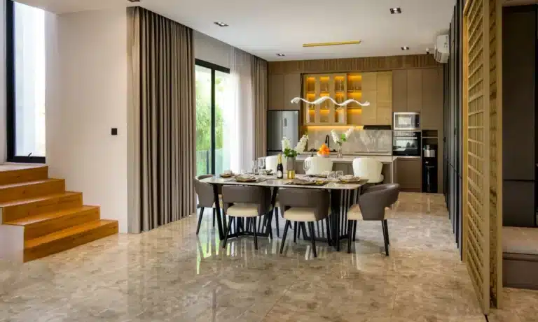 Why Your Sliding Door Sticks (and How to Fix It) 11 Aluminium sliding door opening to alfresco area in modern Australian home